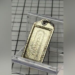 Coach metallic gold hand tag Keychain & chain.  Medium 2.5 x 1.25 inch.